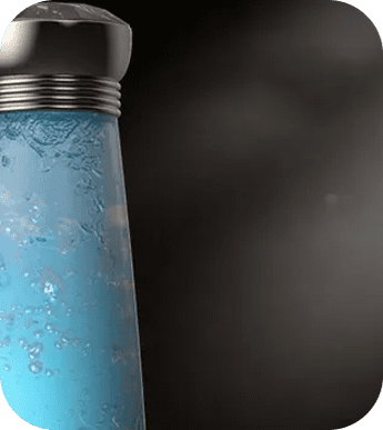 A blue spray bottle with a black background